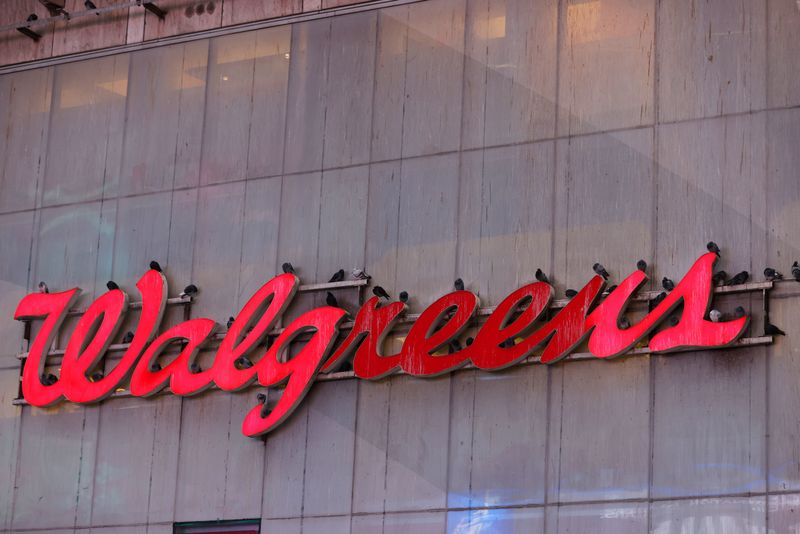 Walgreens cuts profit view, to shut more stores on spending&nbsp;hit