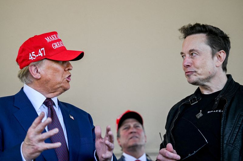 Trump, Musk seen interacting at Kirk memorial after bitter social media&nbsp;feud